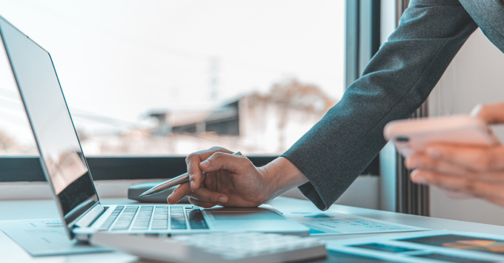 A professional in a work environment utilizing quick internet resulting from reliable IT support. 