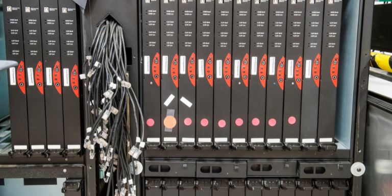 An up close photo of computer wiring within a manufacturing plant.